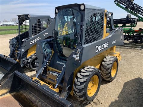 2015 john deere 318e skid steer|john deere 318e lift capacity.